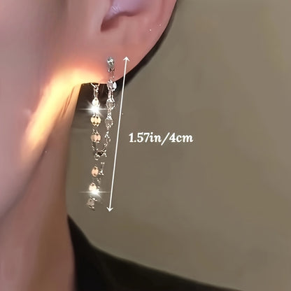 A pair of elegant earrings with double-layer chains and tassels, suitable for gift giving and daily wear, classic daily jewelry accessories, holiday and birthday gifts, anniversary gifts, party essentials